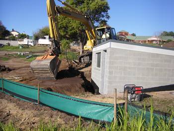 A pumphouse for the community greywater system is adjacent to a planned Neighbourhood House.